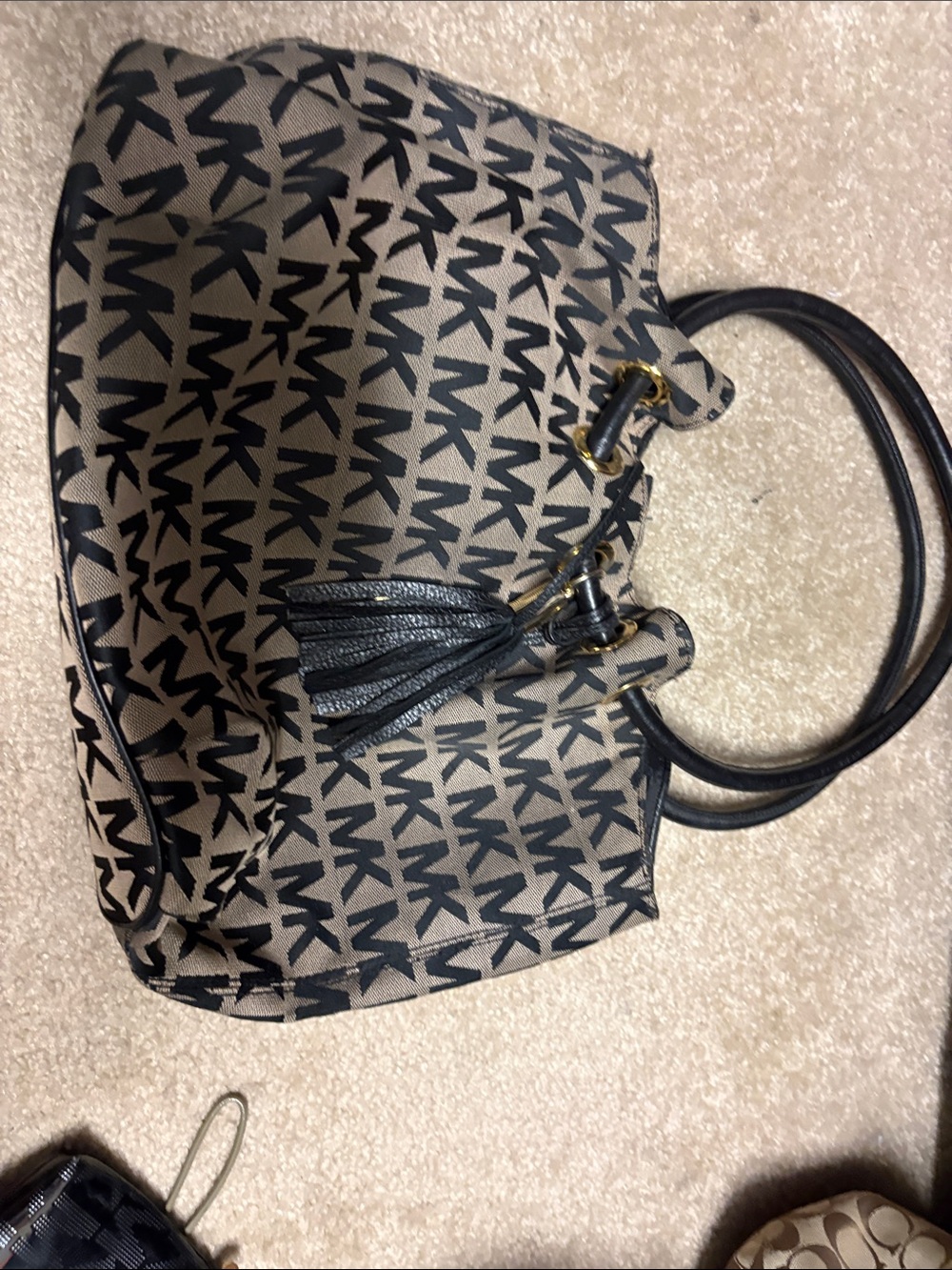 Michael Kors Beige Canvas Tote with Black MK Logo and Black Tassel